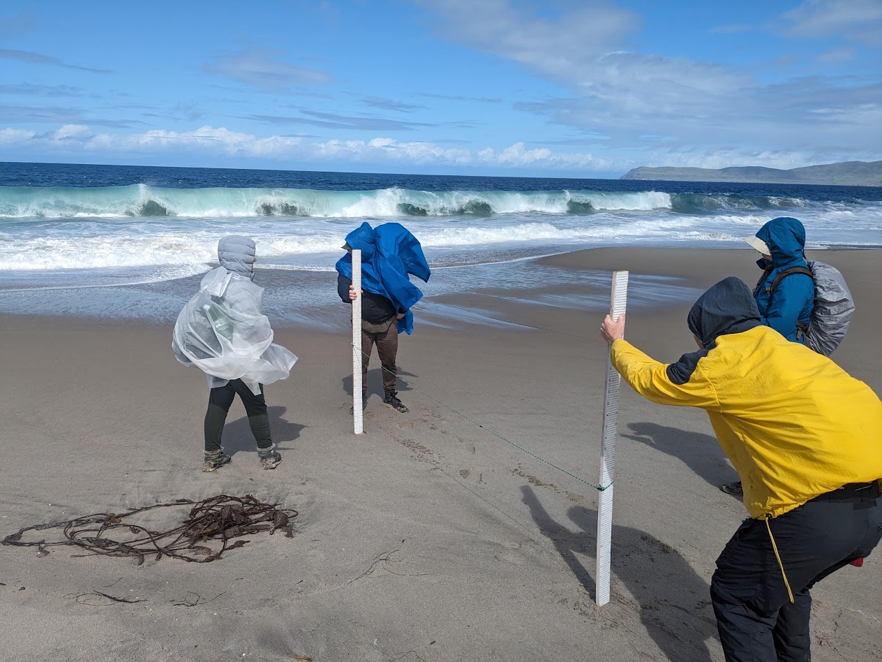 ESRM department picture with students measuring beach geomorphology on Santa Rosa Island